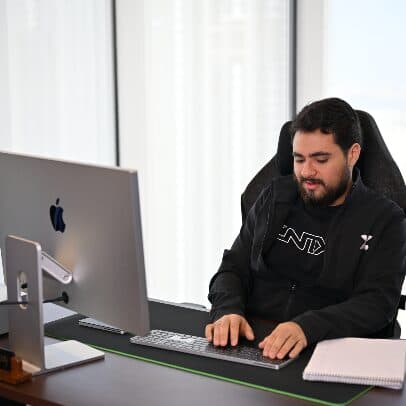 At the desk